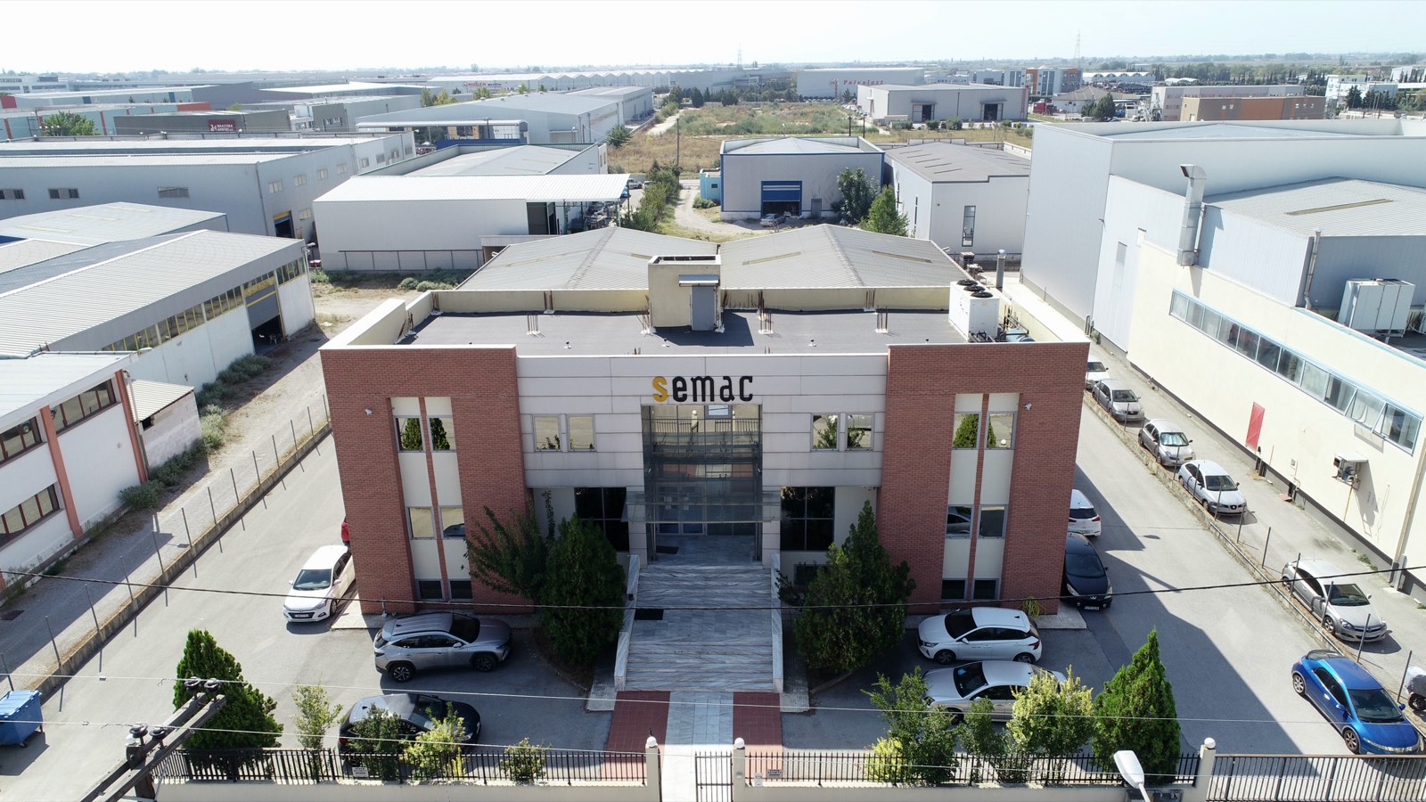 Aerial view of the SEMAC office building in the Sindos industrial area, with the semac sign